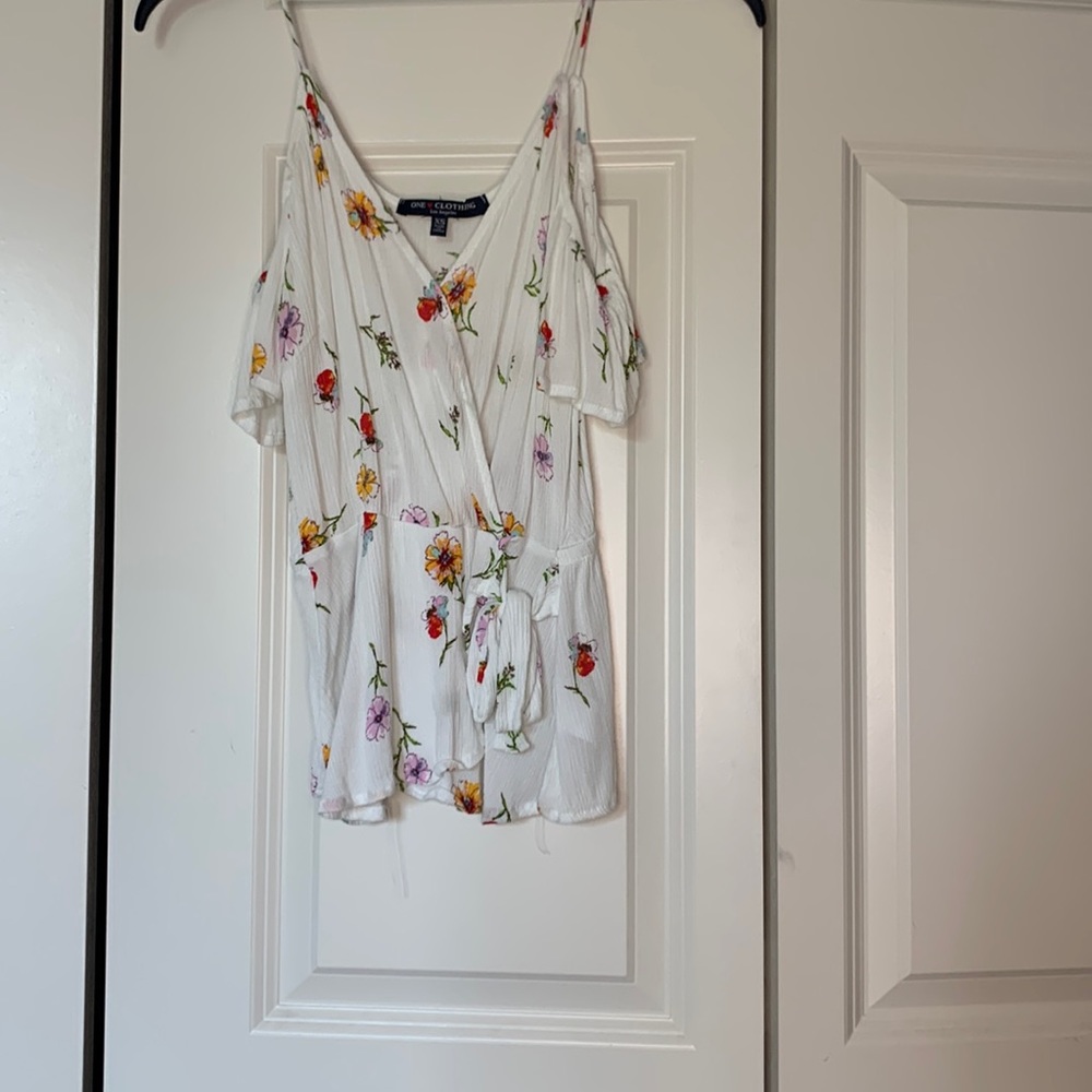 This is a cute spaghetti strap/off the shoulder shirt. It’s also stretchy.